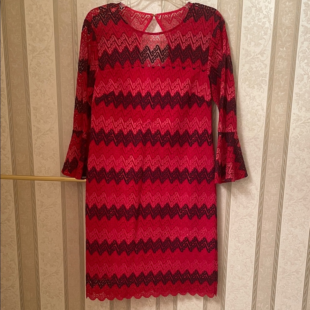 Dressy multi color Lace Trina Turk cocktail/party dress with bell flare sleeve.